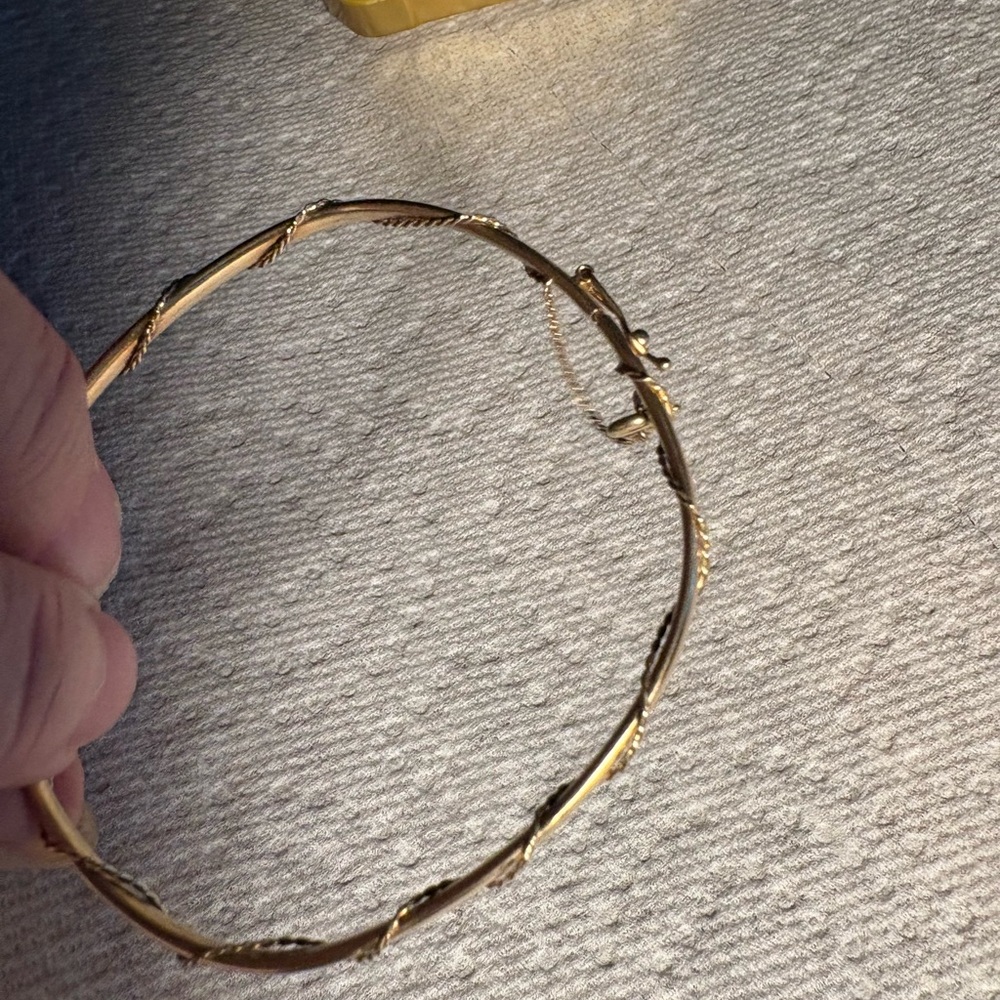 Elegant 14k yellow Gold Bangle Bracelet wrapped in gold chain
